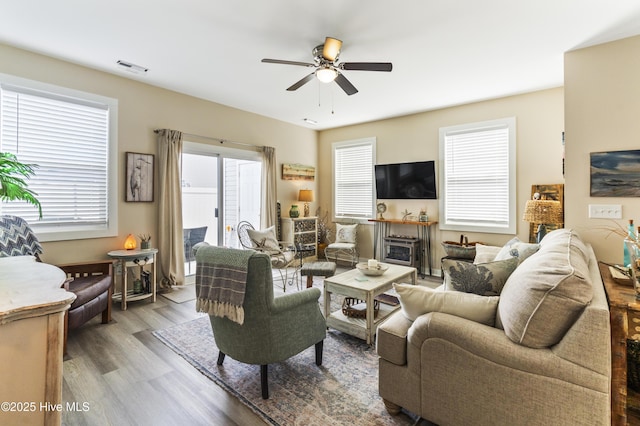 326 Starfish Ln, Sneads Ferry, NC 28460 - living room featuring ceiling fan, visible vents, and wood finished floors
