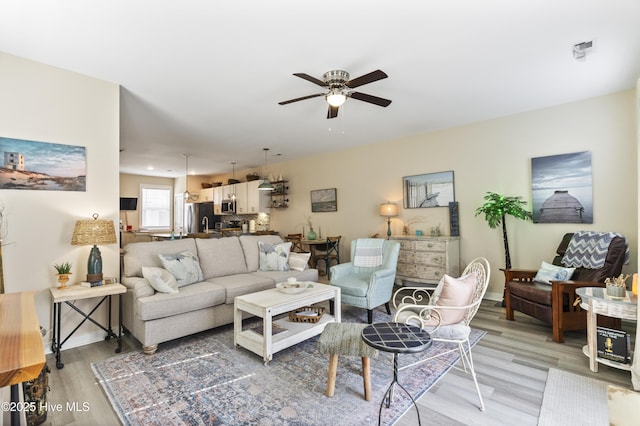 326 Starfish Ln, Sneads Ferry, NC 28460 - living area featuring light wood finished floors and ceiling fan