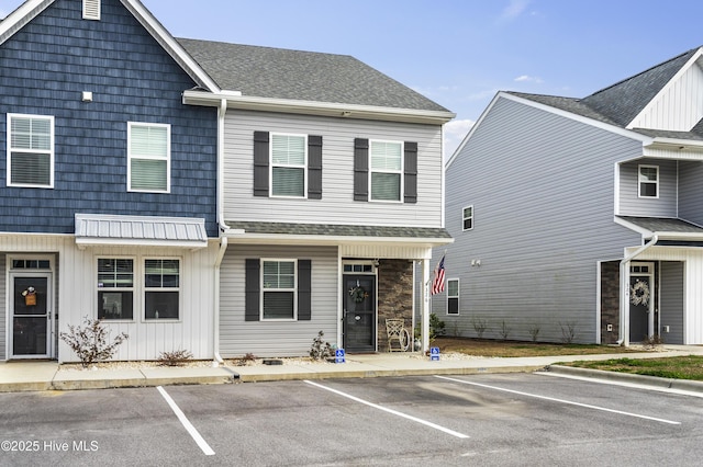 326 Starfish Ln, Sneads Ferry, NC 28460 - view of property featuring a shingled roof, board and batten siding, and uncovered parking