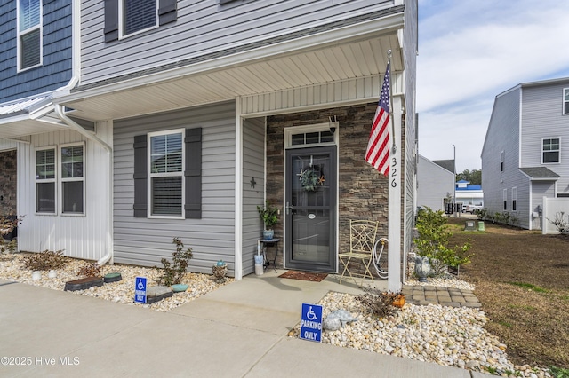 326 Starfish Ln, Sneads Ferry, NC 28460 - view of exterior entry featuring stone siding