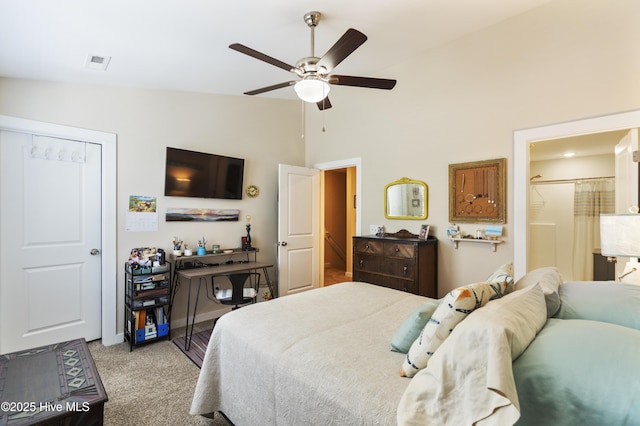 326 Starfish Ln, Sneads Ferry, NC 28460 - bedroom featuring ensuite bathroom, light colored carpet, high vaulted ceiling, visible vents, and a ceiling fan
