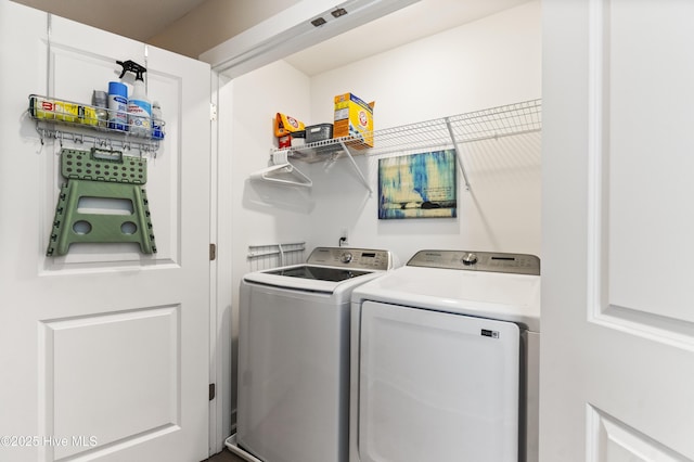 326 Starfish Ln, Sneads Ferry, NC 28460 - clothes washing area featuring separate washer and dryer and laundry area