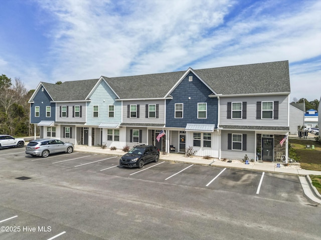 326 Starfish Ln, Sneads Ferry, NC 28460 - exterior space featuring a shingled roof and uncovered parking