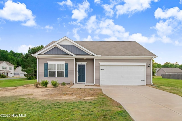 view of front of home with an attached garage, board and batten siding, driveway, and a front lawn