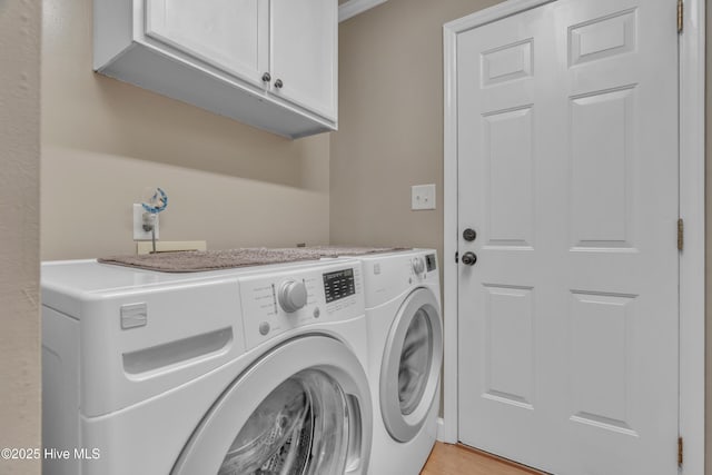 515 Blue Heron Dr, Newport, NC 28570 - laundry room with washer and dryer, cabinet space, and light wood finished floors