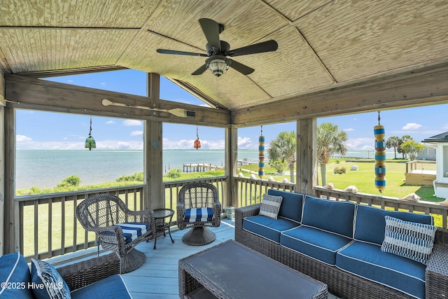 515 Blue Heron Dr, Newport, NC 28570 - sunroom featuring a water view, vaulted ceiling, a ceiling fan, an outdoor living space, and plenty of natural light