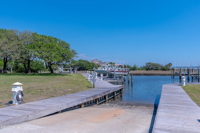 515 Blue Heron Dr, Newport, NC 28570 - dock area featuring boat lift, a water view, and a yard