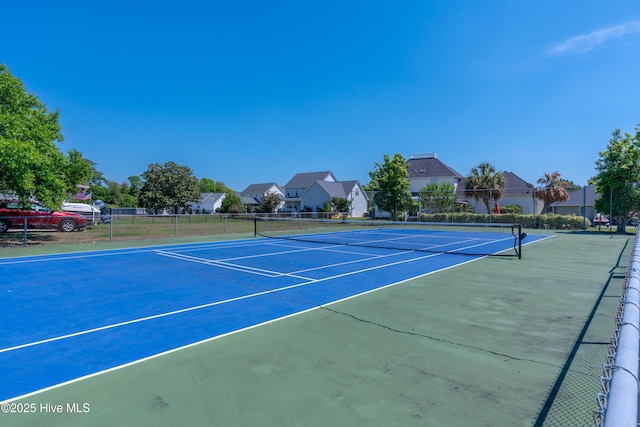 515 Blue Heron Dr, Newport, NC 28570 - view of tennis court featuring a residential view