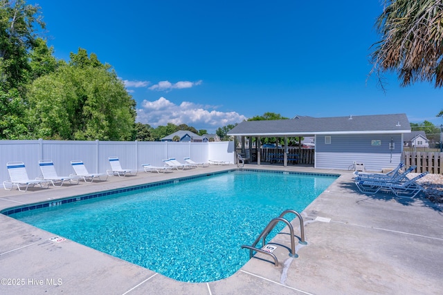 515 Blue Heron Dr, Newport, NC 28570 - community pool with a patio