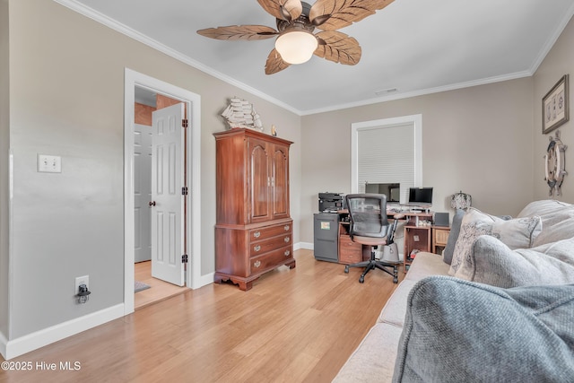 515 Blue Heron Dr, Newport, NC 28570 - office area with light wood finished floors, crown molding, ceiling fan, and baseboards