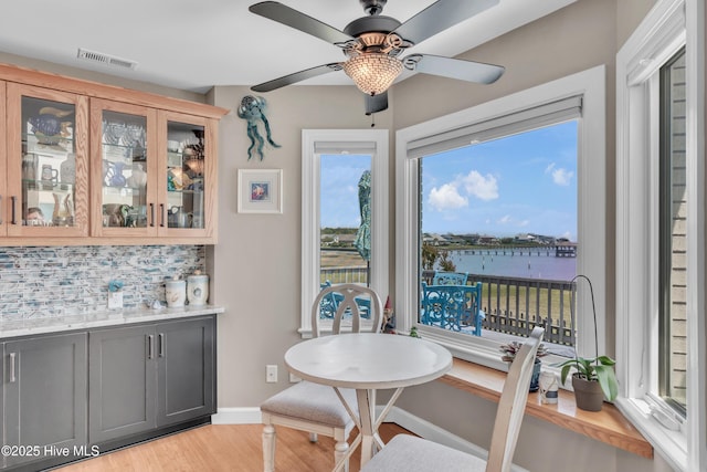 515 Blue Heron Dr, Newport, NC 28570 - dining space featuring light wood finished floors, baseboards, and ceiling fan