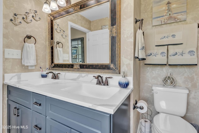 515 Blue Heron Dr, Newport, NC 28570 - bathroom featuring double vanity and toilet