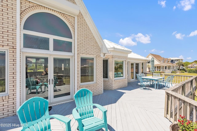 515 Blue Heron Dr, Newport, NC 28570 - wooden deck featuring outdoor dining space and french doors