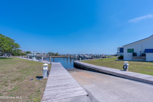 515 Blue Heron Dr, Newport, NC 28570 - dock area featuring a water view, a yard, and boat lift