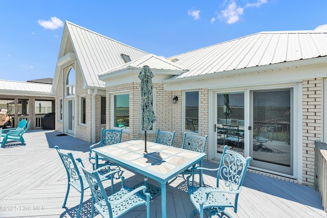 515 Blue Heron Dr, Newport, NC 28570 - wooden deck featuring outdoor dining space