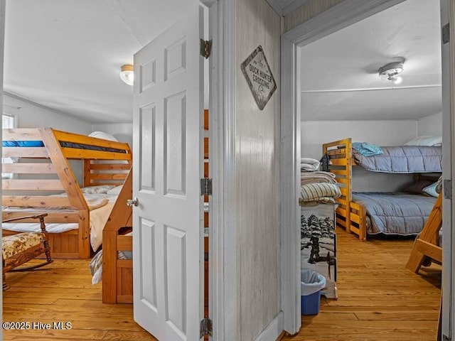 bedroom with hardwood / wood-style floors