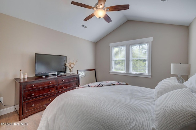 237 Pine Village Dr, Rocky Point, NC 28457 - bedroom with light wood-style flooring, vaulted ceiling, and a ceiling fan