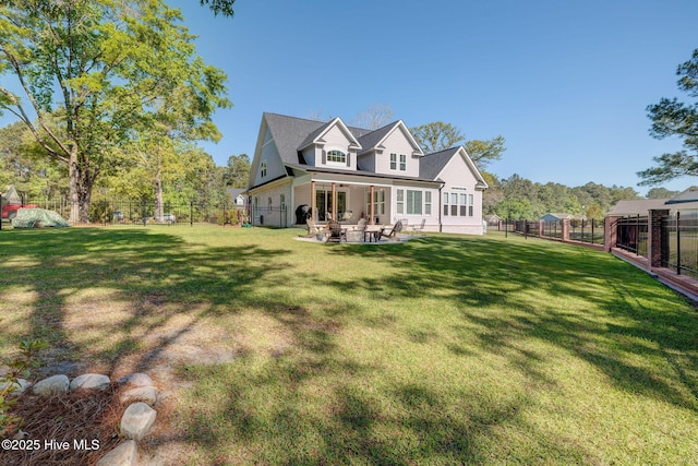237 Pine Village Dr, Rocky Point, NC 28457 - view of front of house featuring a fenced backyard and a patio