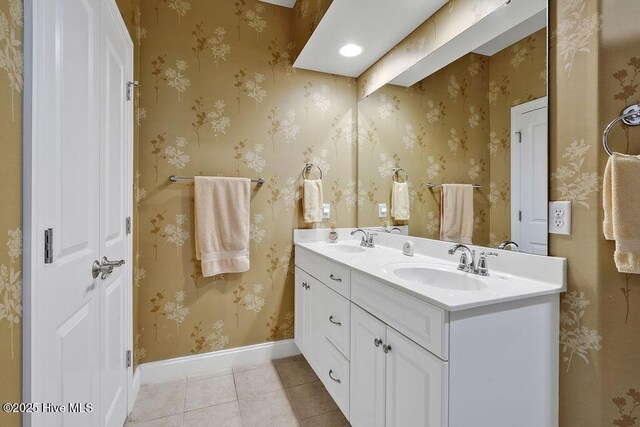 3284 Gardenwood Dr, Leland, NC 28451 - full bath featuring tile patterned flooring, double vanity, and baseboards
