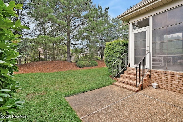 3284 Gardenwood Dr, Leland, NC 28451 - view of green lawn featuring entry steps