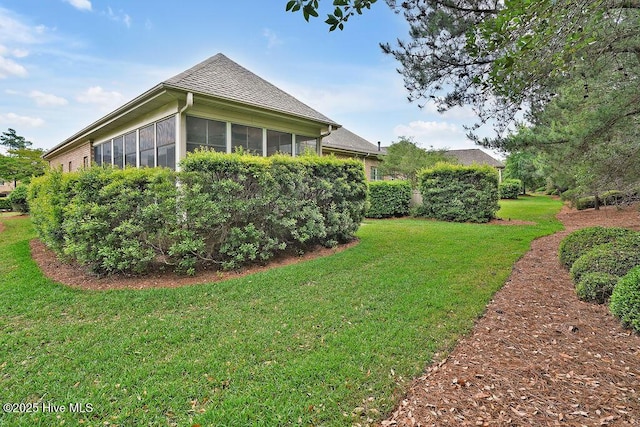 3284 Gardenwood Dr, Leland, NC 28451 - view of green lawn featuring a sunroom