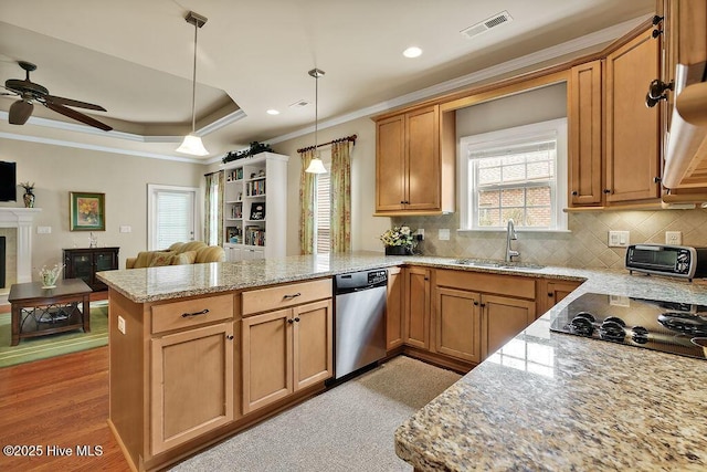 3284 Gardenwood Dr, Leland, NC 28451 - kitchen featuring a sink, a peninsula, dishwasher, ornamental molding, and a ceiling fan