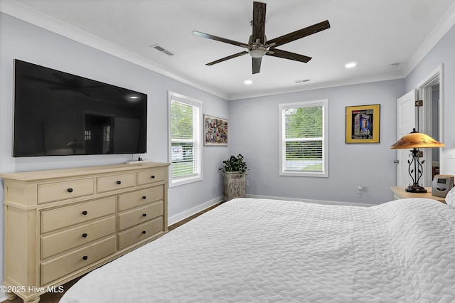 bedroom with multiple windows, baseboards, crown molding, recessed lighting, and a ceiling fan