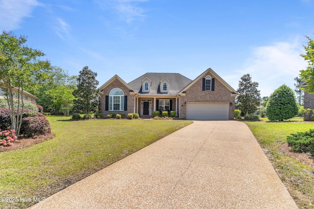 traditional-style house with driveway, brick siding, and a front yard