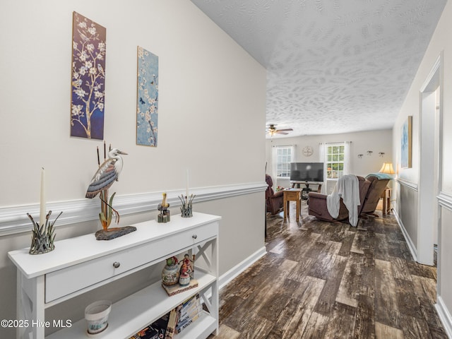 102 Flat Rock Ln, Richlands, NC 28574 - hall with a textured ceiling, dark wood-type flooring, and baseboards