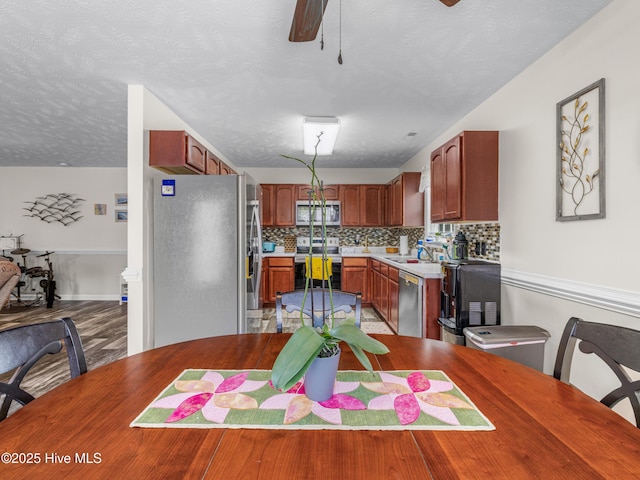 102 Flat Rock Ln, Richlands, NC 28574 - dining space featuring a ceiling fan and light wood-type flooring