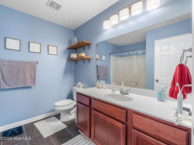 102 Flat Rock Ln, Richlands, NC 28574 - bathroom featuring toilet, vanity, tile patterned flooring, baseboards, and a shower with curtain