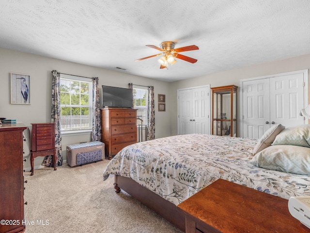 102 Flat Rock Ln, Richlands, NC 28574 - carpeted bedroom with two closets and ceiling fan