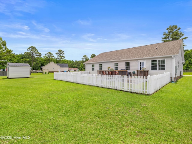 102 Flat Rock Ln, Richlands, NC 28574 - rear view of house with a shingled roof and a wooden deck