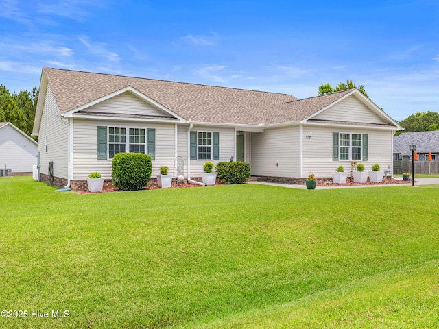 102 Flat Rock Ln, Richlands, NC 28574 - ranch-style home featuring roof with shingles, a front yard, and central air condition unit