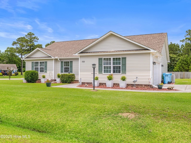 102 Flat Rock Ln, Richlands, NC 28574 - view of front facade featuring roof with shingles, an attached garage, and concrete driveway