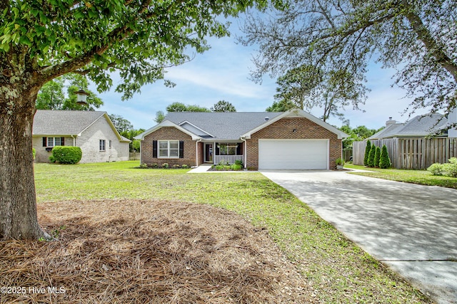 ranch-style home with an attached garage, driveway, and brick siding