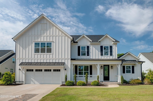374 Yucca Ln, Wilmington, NC 28412 - modern inspired farmhouse with board and batten siding, a porch, and a standing seam roof