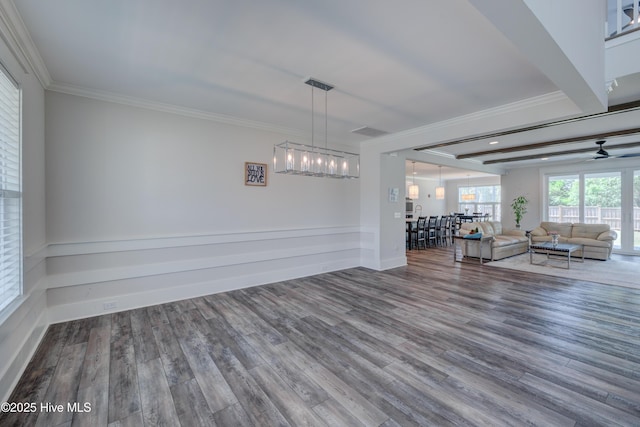 374 Yucca Ln, Wilmington, NC 28412 - living area featuring crown molding, a chandelier, wood finished floors, a ceiling fan, and baseboards