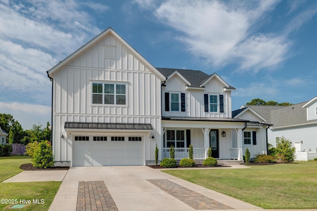 374 Yucca Ln, Wilmington, NC 28412 - modern farmhouse style home featuring board and batten siding, a porch, a front yard, concrete driveway, and an attached garage