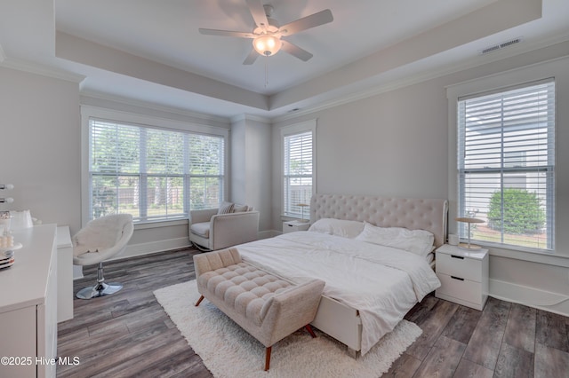 374 Yucca Ln, Wilmington, NC 28412 - bedroom with a raised ceiling, wood finished floors, crown molding, baseboards, and a ceiling fan