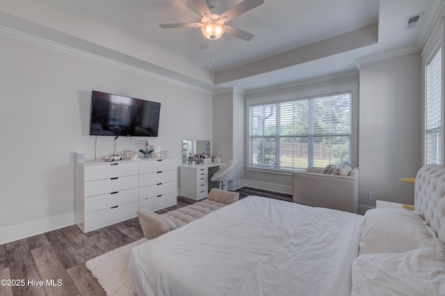 374 Yucca Ln, Wilmington, NC 28412 - bedroom with a tray ceiling, wood finished floors, baseboards, ceiling fan, and crown molding