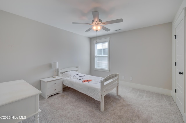374 Yucca Ln, Wilmington, NC 28412 - bedroom featuring light colored carpet, baseboards, and a ceiling fan
