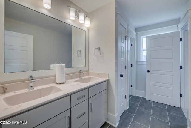 374 Yucca Ln, Wilmington, NC 28412 - bathroom with double vanity and tile patterned floors