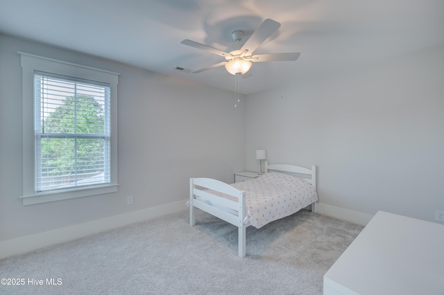 374 Yucca Ln, Wilmington, NC 28412 - bedroom with carpet, baseboards, and ceiling fan