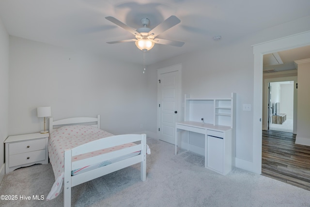 374 Yucca Ln, Wilmington, NC 28412 - bedroom with attic access, light colored carpet, baseboards, and a ceiling fan