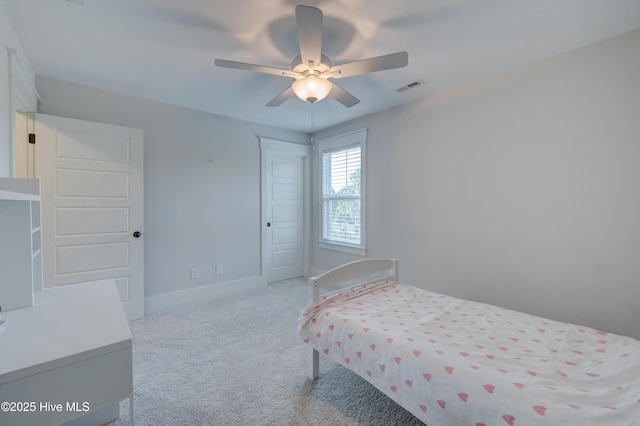 374 Yucca Ln, Wilmington, NC 28412 - carpeted bedroom featuring baseboards, ceiling fan, and a closet