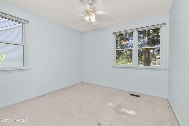 103 Arborvitae Ct, Pine Knoll Shores, NC 28512 - unfurnished room with carpet, a ceiling fan, and baseboards