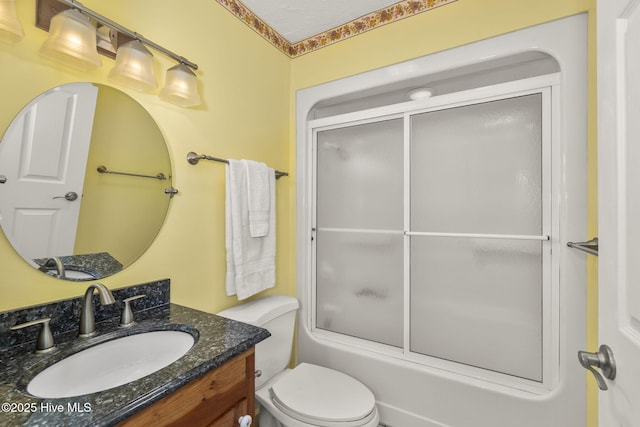 103 Arborvitae Ct, Pine Knoll Shores, NC 28512 - bathroom with vanity, toilet, and enclosed tub / shower combo