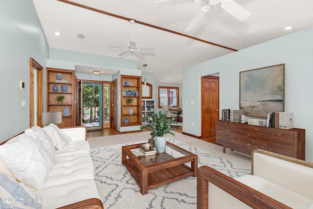 103 Arborvitae Ct, Pine Knoll Shores, NC 28512 - living area featuring ceiling fan, lofted ceiling, recessed lighting, and baseboards