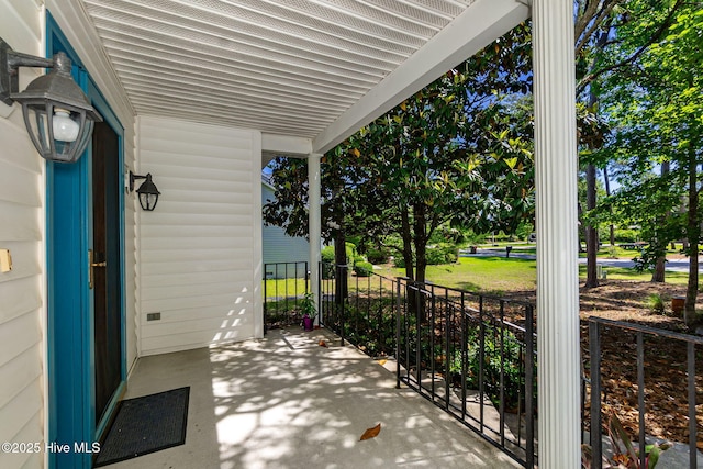 103 Arborvitae Ct, Pine Knoll Shores, NC 28512 - view of covered porch